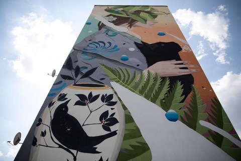 Mural on a residential building in the workers quarter Traktorny Zavod in Minsk