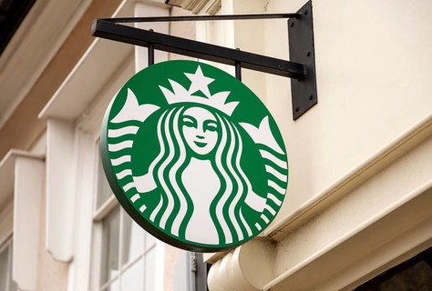 Starbucks sign outside High Street shop cafe