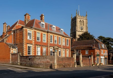 Tower of church of St Mary and Brownston House or Brownstone House c1700