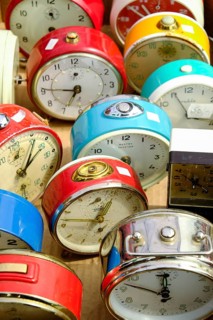 Old alarm clocks for sale at a flea market