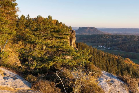 Rocks and autumnal mixed forest on the Pfaffenstein