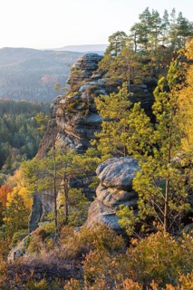 Rocks and autumnal mixed forest on the Pfaffenstein