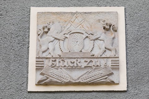 Mueller's coat of arms and Glueckzu as the miller's greeting