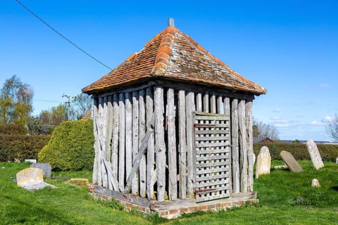 Bell cage building