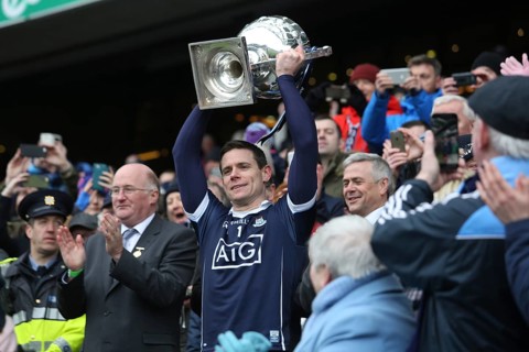 Gaelic footballer and Dublin captain Stephen Cluxton raises the League trophy in Croke Park