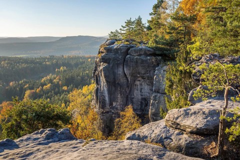 Rocks and autumnal mixed forest on the Pfaffenstein