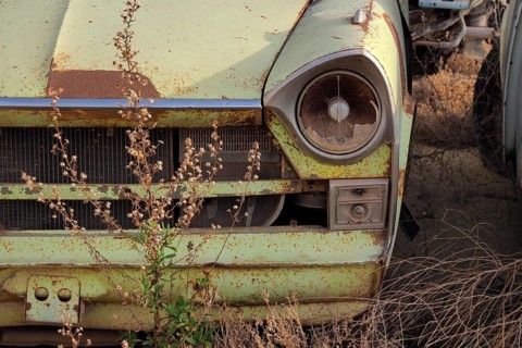 Lamp and radiator grille of a scrapped Peugeot