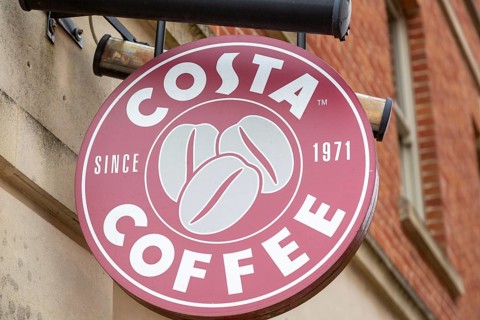 Close up of Costa Coffee trademark sign mounted on a wall