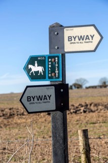 Byway and bridleway signpost showing public rights of way
