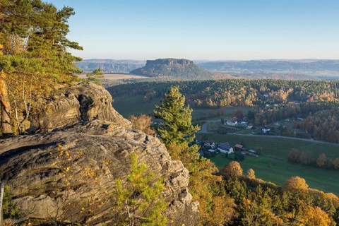 Rocks and autumnal mixed forest on the Pfaffenstein