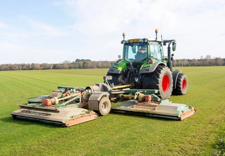 Fendt 313 tractor mowing grass