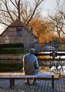 Bronze sculpture of the local poet Paul Advena at the water mill in Heek-Nienborg