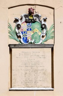 Coat of Arms and Latin inscription on Old School building