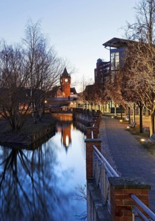 St. Anthony's Parish Church and Old Town Hall Tower with the River Dinkel in the Evening