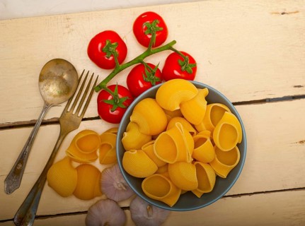 Italian snail lumaconi pasta with ripe cherry tomatoes sauce ingredients