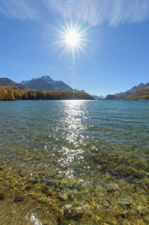Lake Silsersee with sun in autumn