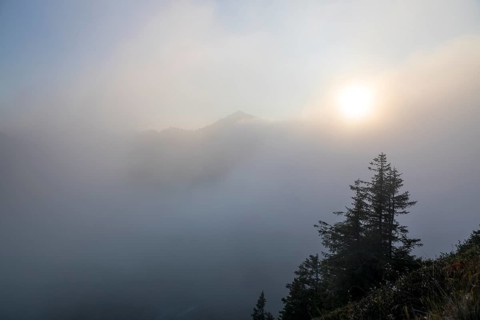 Fog in the high valley on an autumn evening at Potlakopf