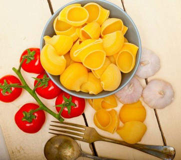 Italian snail lumaconi pasta with ripe cherry tomatoes sauce ingredients
