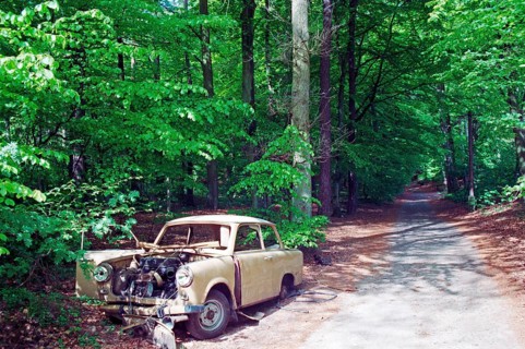 Scrap Trabi parked in the forest near Binz