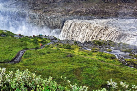Hikers at the edge of Dettifoss