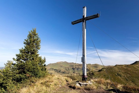 Summit cross in the morning light on Portlakopf