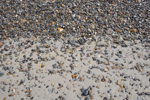 Sandy beach with pebble