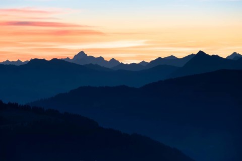 Mountain panorama in front of sunrise from Portlakopf