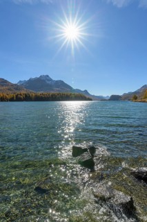 Lake Silsersee with sun in autumn