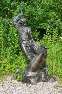 Sculpture Pulling out of the Swamp by the Pigtail