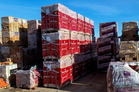 Piles of bricks in Jewson builders merchant yard