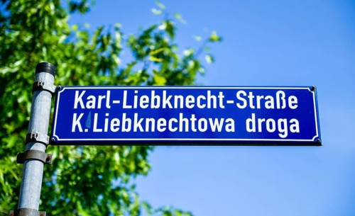 Multilingual street sign Sorbian and German