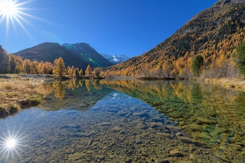 Lake with sun in autumn