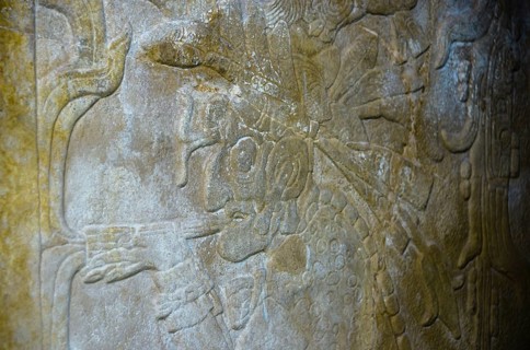 God of the underworld smoking a pipe