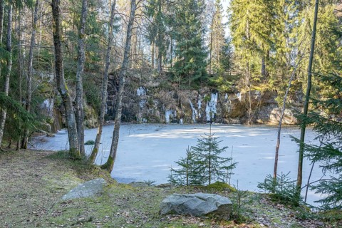 Frozen lake in an old quarry