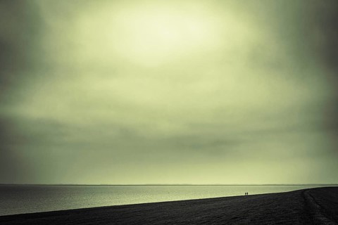 Walkers on the North Sea coast