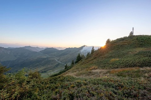 Summit cross in the morning light on Portlakopf