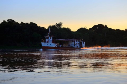 Riverboat on the Rio Sao Lourenco at sunrise
