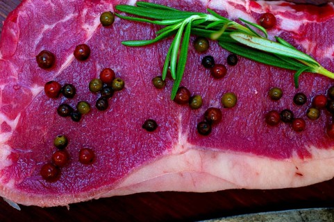 Raw uncooked ribeye beef steak butcher selection