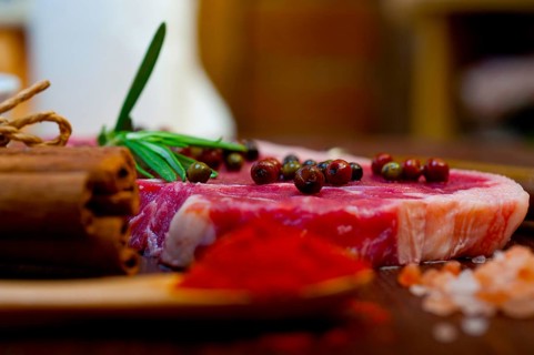Raw uncooked ribeye beef steak butcher selection