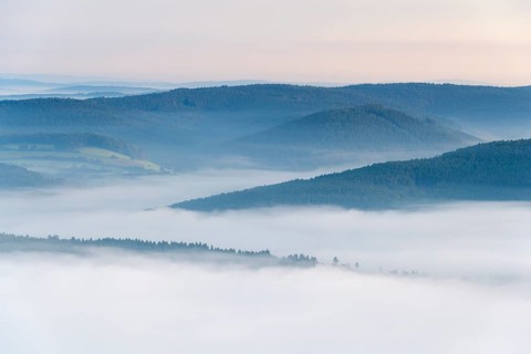View from Katzenbuckel mountain with morning mist