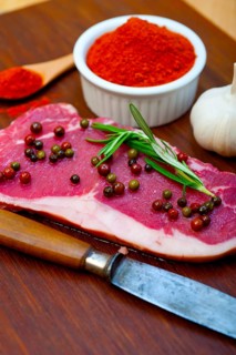 Raw uncooked ribeye beef steak butcher selection