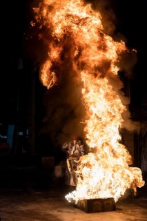 Firefighter extinguishes a heptane 2B-Pan fire with a 2-BTP extinguisher