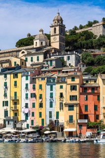 Pastel-coloured house facades in the harbour of Portovenere