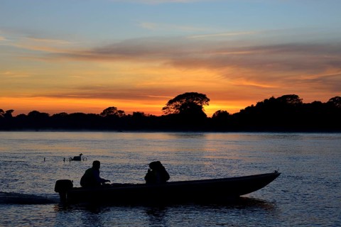 Tourist boat on the Rio Sao Lourenco at sunrise