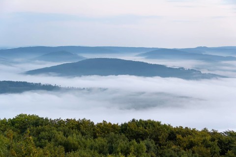 View from Katzenbuckel mountain with morning mist