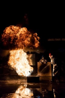 Firefighter extinguishes a heptane 2B-Pan fire with a 2-BTP extinguisher