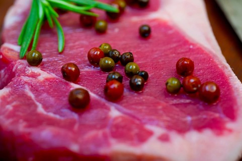 Raw uncooked ribeye beef steak butcher selection