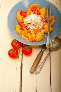Italian snail lumaconi pasta with ripe cherry tomatoes sauce ingredients