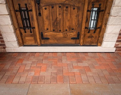 Front door of a house without doormat