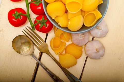 Italian snail lumaconi pasta with ripe cherry tomatoes sauce ingredients
